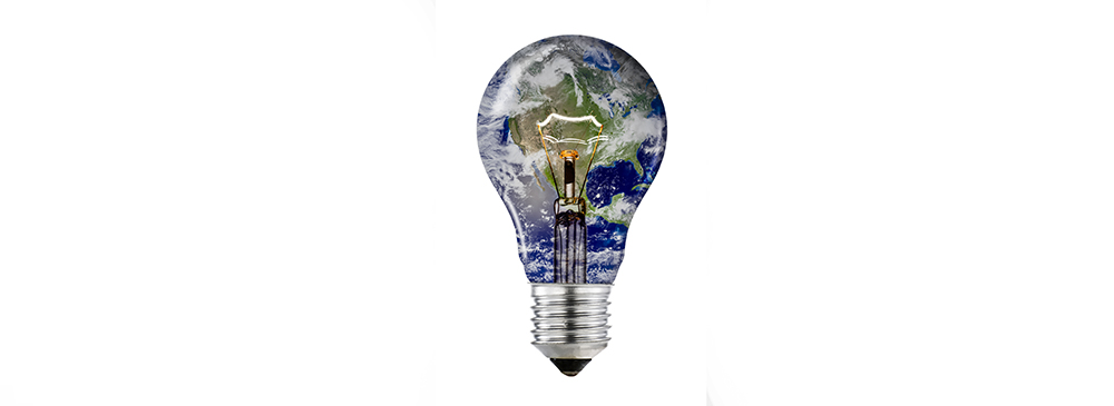 A light bulb with the earth inside