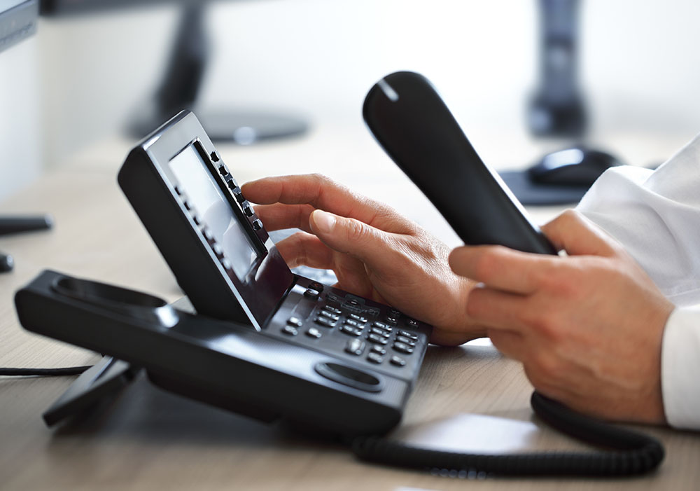 Man dialling phone